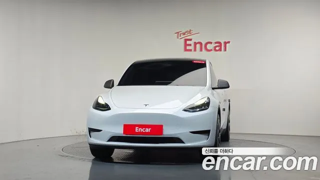 Tesla Model Y — Фото автомобиля 3