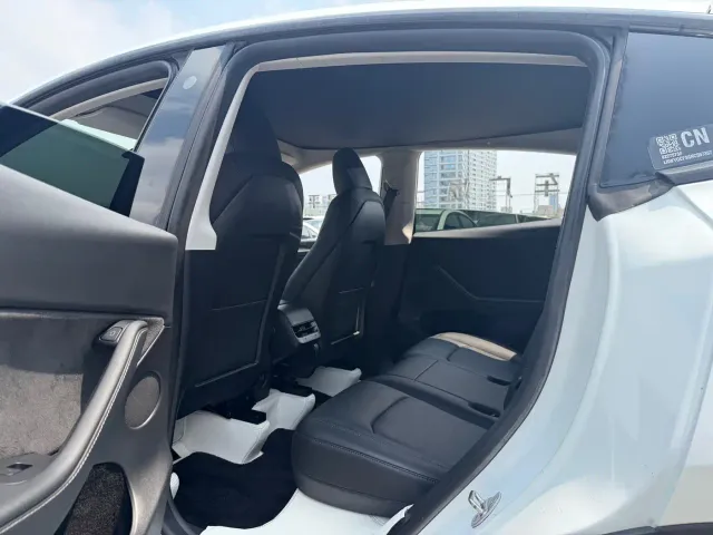Tesla Model Y — Фото автомобиля 6