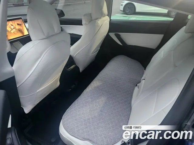Tesla Model Y — Фото автомобиля 7