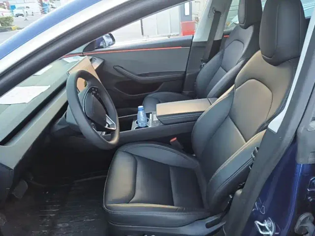 Tesla Model 3 — Фото автомобиля 14