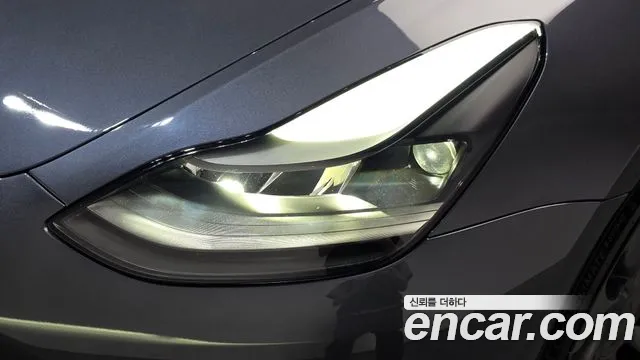 Tesla Model 3 — Фото автомобиля 7