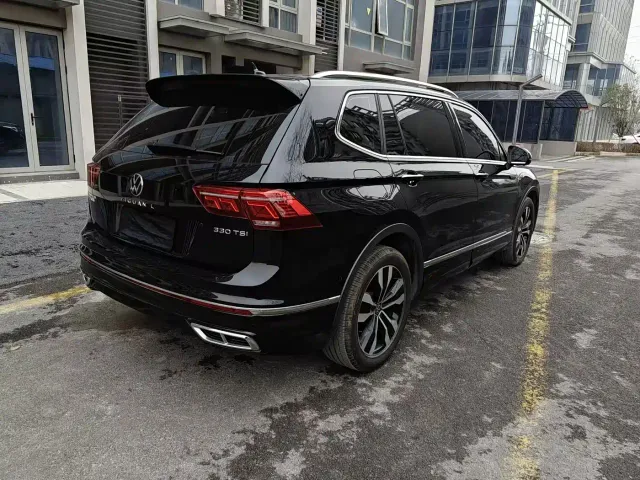 Volkswagen Tiguan L — Фото автомобиля 11