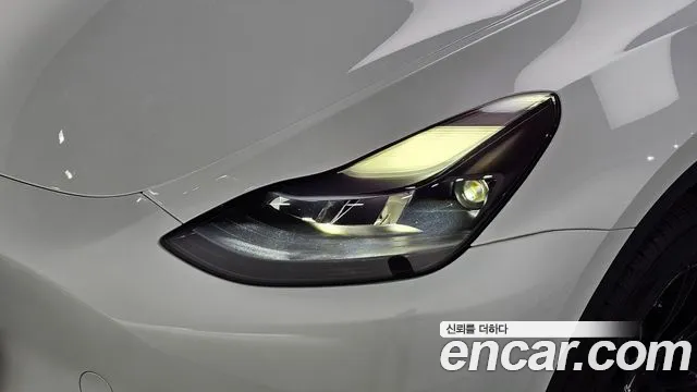 Tesla Model Y — Фото автомобиля 22