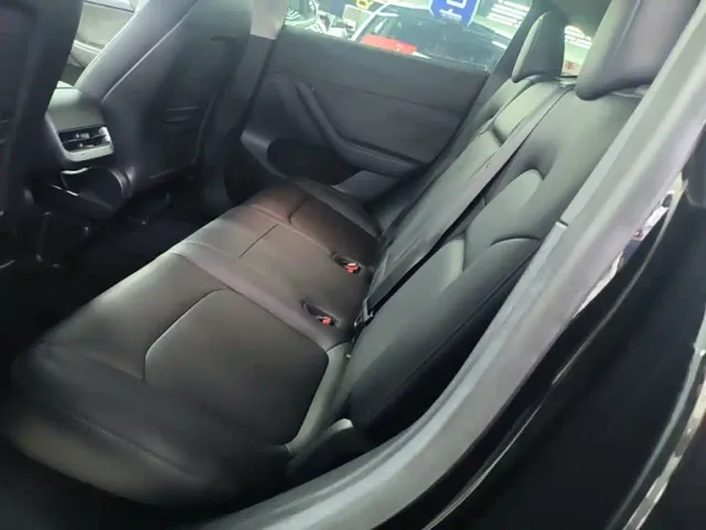Tesla Model Y — Фото автомобиля 16