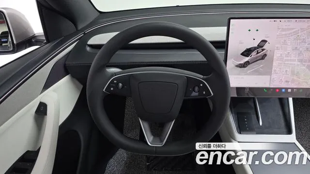 Tesla Model Y — Фото автомобиля 13