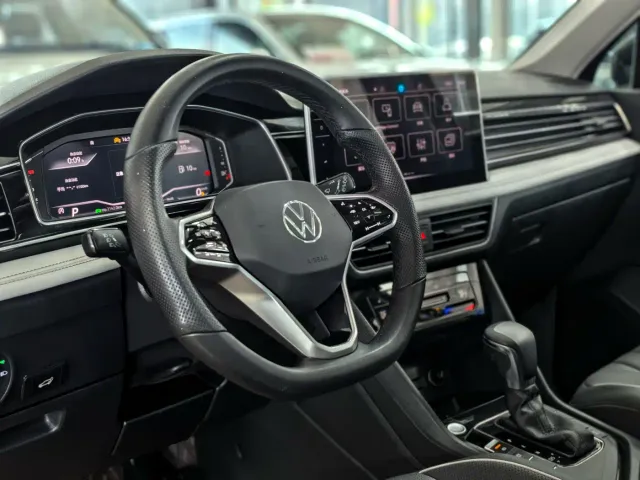 Volkswagen Tiguan L — Фото автомобиля 9