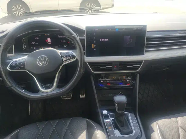 Volkswagen Tiguan L — Фото автомобиля 12