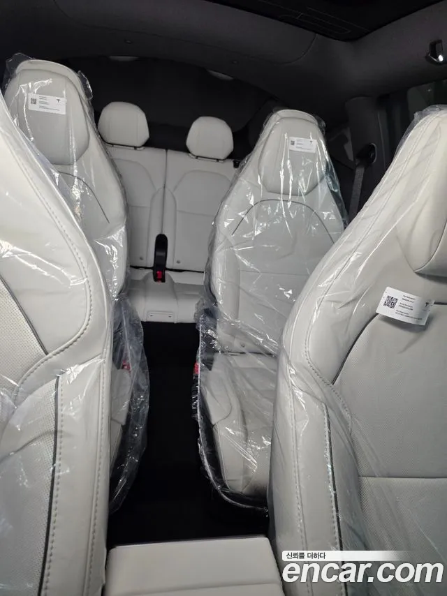 Tesla Model Y — Фото автомобиля 12