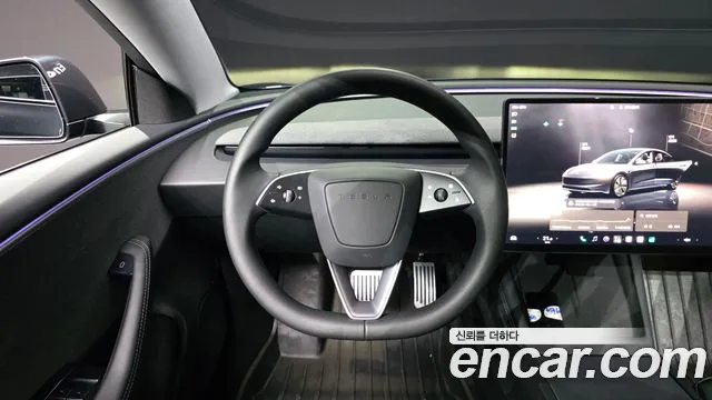 Tesla Model 3 — Фото автомобиля 11