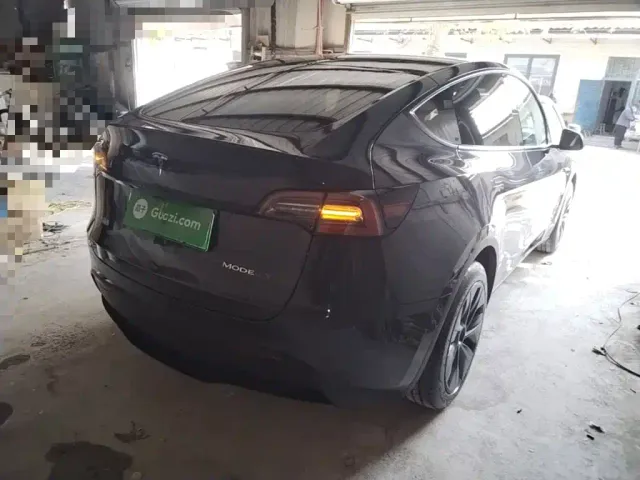 Tesla Model Y — Фото автомобиля 6