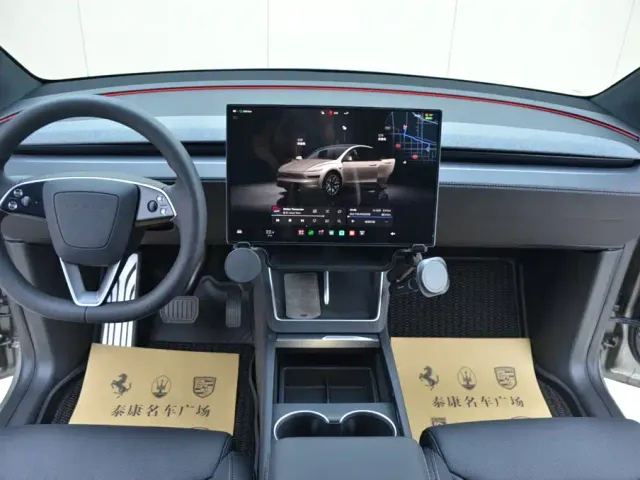 Tesla Model Y L — Фото автомобиля 6