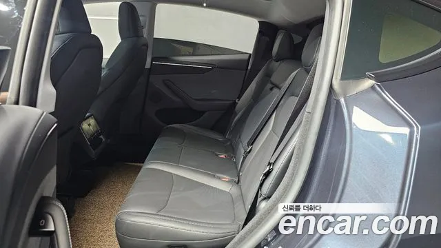 Tesla Model Y — Фото автомобиля 12