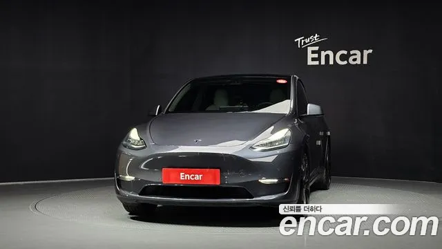 Tesla Model Y — Фото автомобиля 3