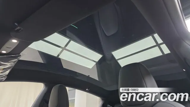 Tesla Model Y — Фото автомобиля 23
