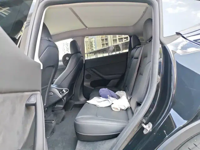 Tesla Model Y — Фото автомобиля 18