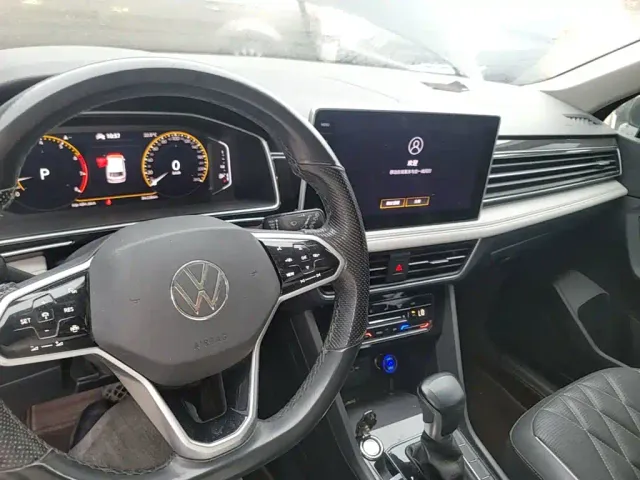 Volkswagen Tiguan L — Фото автомобиля 9