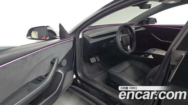 Tesla Model 3 — Фото автомобиля 15