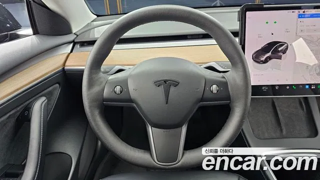 Tesla Model 3 — Фото автомобиля 12