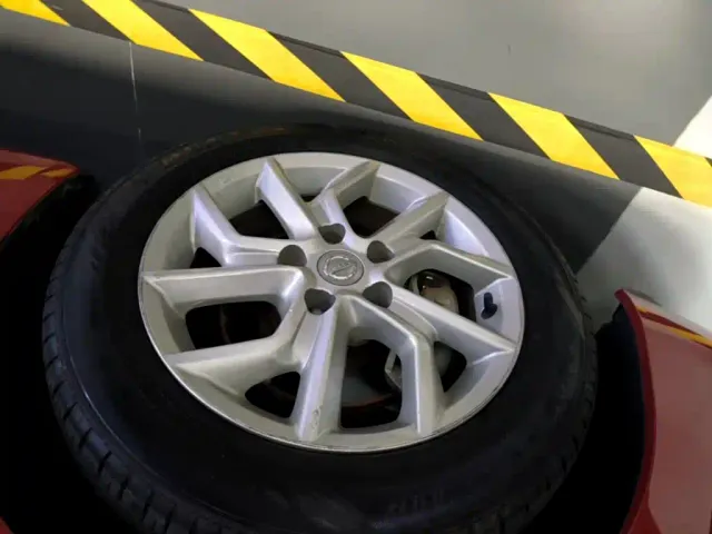Nissan Tiida — Фото автомобиля 22