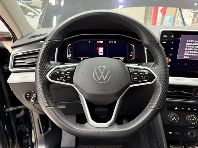 Volkswagen Tiguan L — Фото автомобиля 11