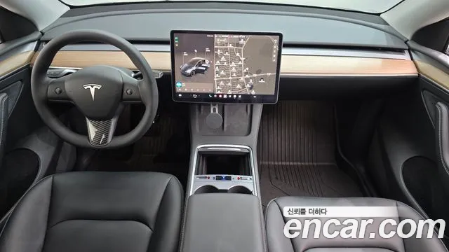 Tesla Model Y — Фото автомобиля 10