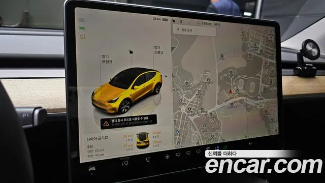 Tesla Model Y — Фото автомобиля 24