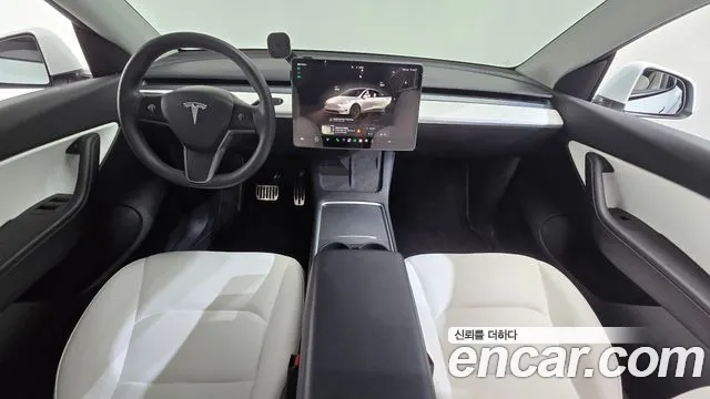 Tesla Model Y — Фото автомобиля 6