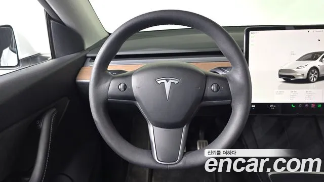Tesla Model Y — Фото автомобиля 19