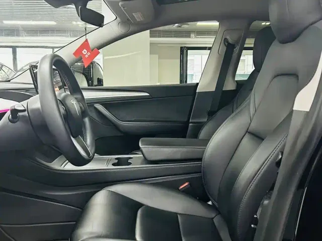 Tesla Model Y — Фото автомобиля 7