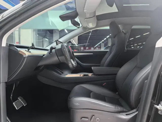 Tesla Model Y — Фото автомобиля 8