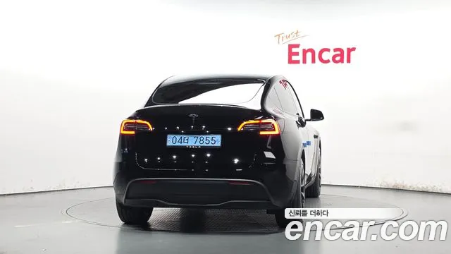 Tesla Model Y — Фото автомобиля 4