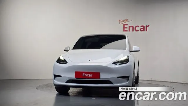 Tesla Model Y — Фото автомобиля 3