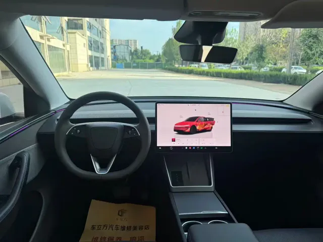 Tesla Model Y — Фото автомобиля 5