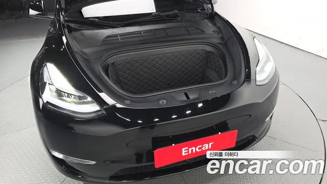 Tesla Model Y — Фото автомобиля 6