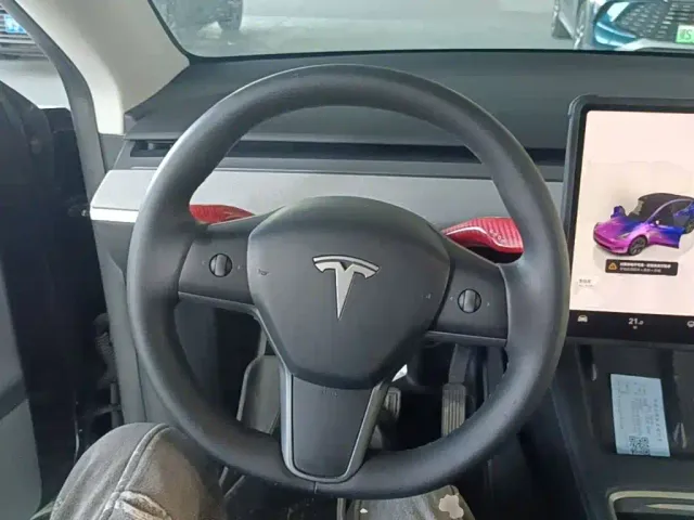 Tesla Model Y — Фото автомобиля 10