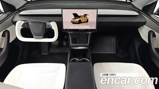 Tesla Model Y — Фото автомобиля 9