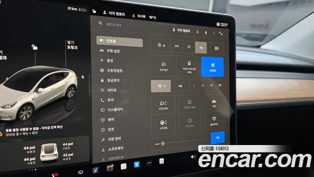 Tesla Model Y — Фото автомобиля 16