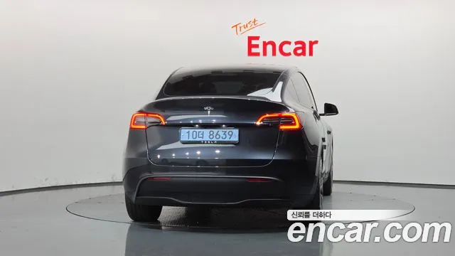 Tesla Model Y — Фото автомобиля 4