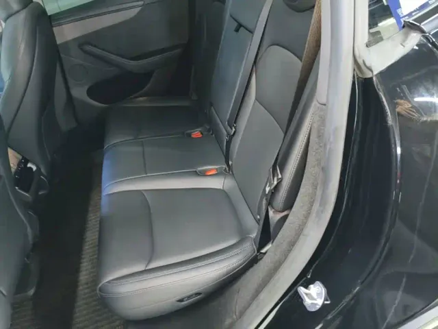 Tesla Model Y — Фото автомобиля 16