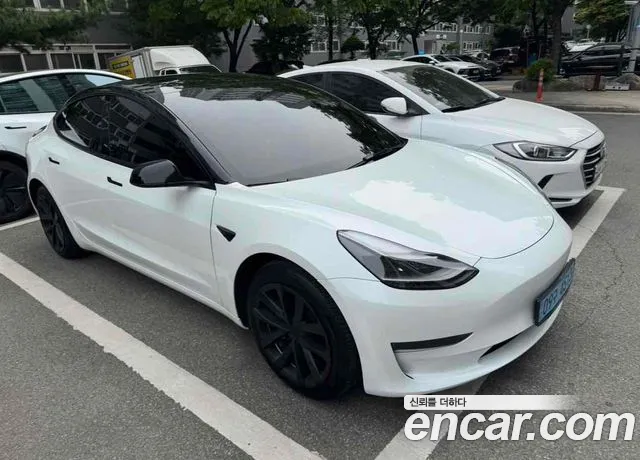Tesla Model 3 — Фото автомобиля 5