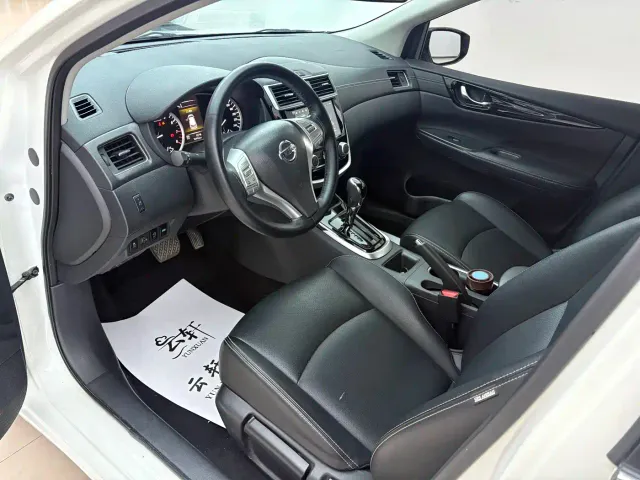 Nissan Tiida — Фото автомобиля 17