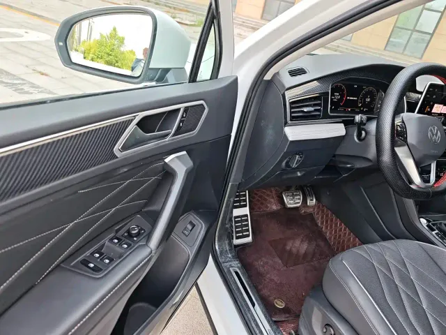Volkswagen Tiguan L — Фото автомобиля 8