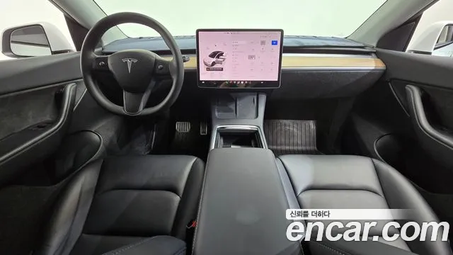 Tesla Model Y — Фото автомобиля 10