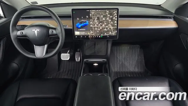 Tesla Model Y — Фото автомобиля 7