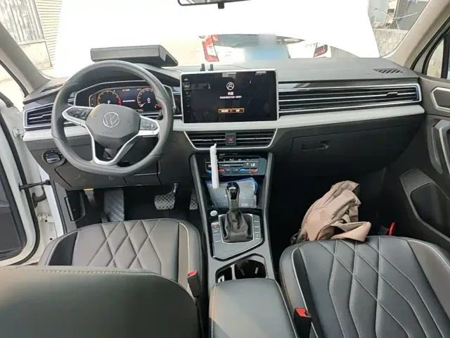 Volkswagen Tiguan L — Фото автомобиля 9