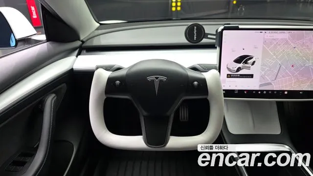 Tesla Model 3 — Фото автомобиля 13