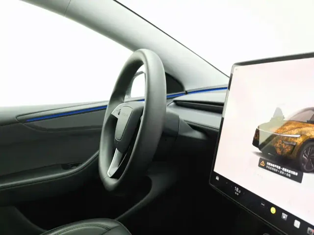 Tesla Model Y — Фото автомобиля 22