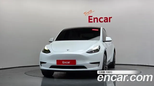 Tesla Model Y — Фото автомобиля 3