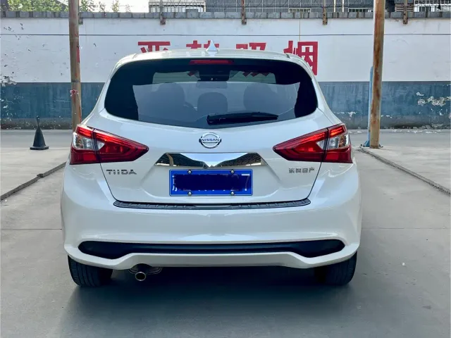 Nissan Tiida — Фото автомобиля 23
