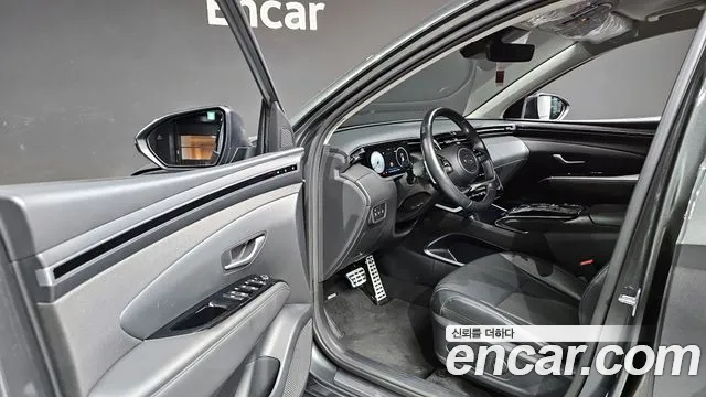 Hyundai Tucson Tucson (NX4) Бензин 1.6 Turbo 4WD — Фото автомобиля 11